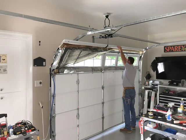 Garage door section replacement by East Haven Garage Door Repair in East Haven