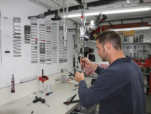East Haven Garage Door Repair safety certified technician performing precision spring replacement in East Haven