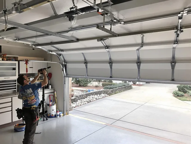 Garage door track repair service by East Haven Garage Door Repair in East Haven